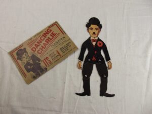 1930s British made moveable Charlie Chaplin cardboard figure set