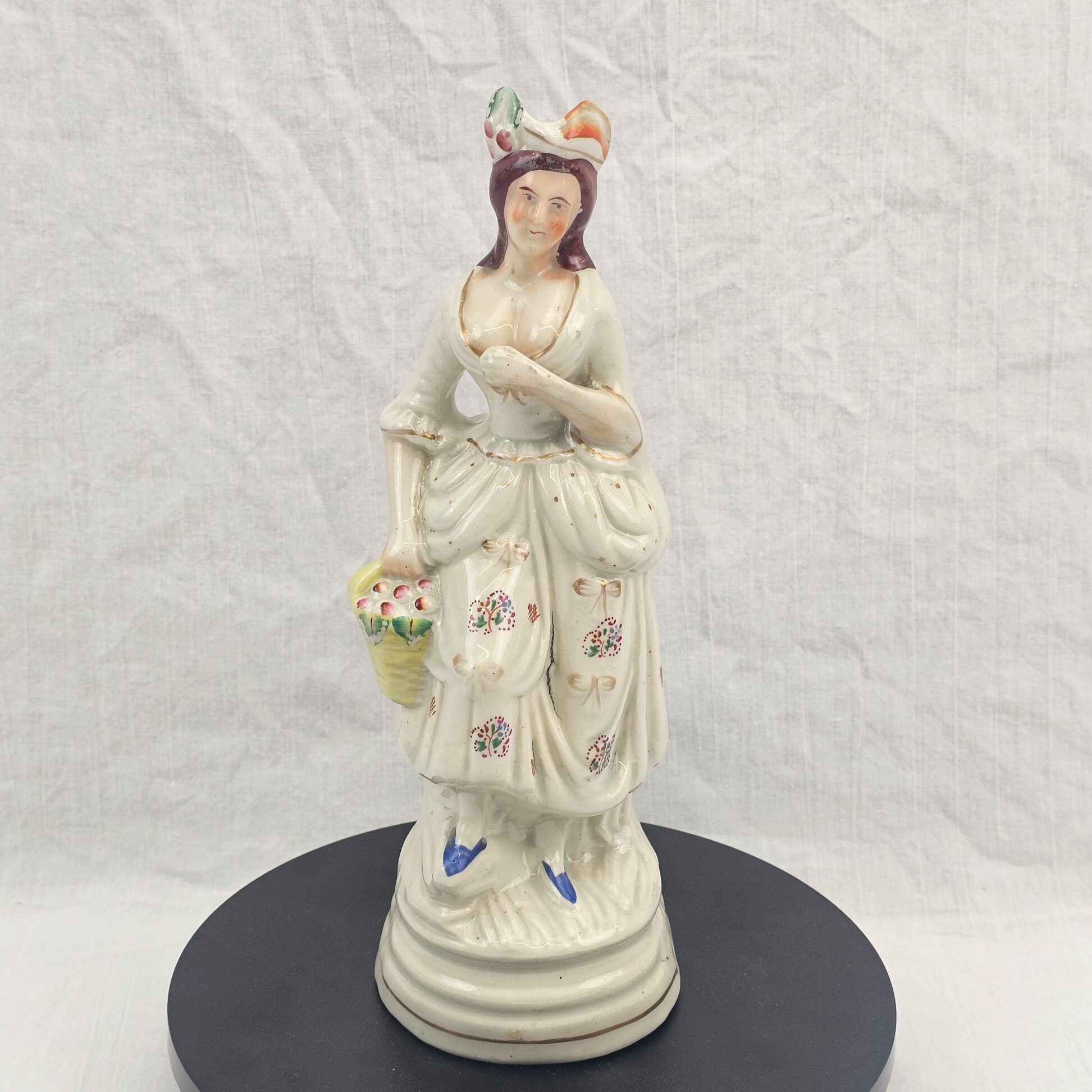 19th Century Victorian Staffordshire Pottery Figure of a Lady Fruit Seller, c.1850–1870