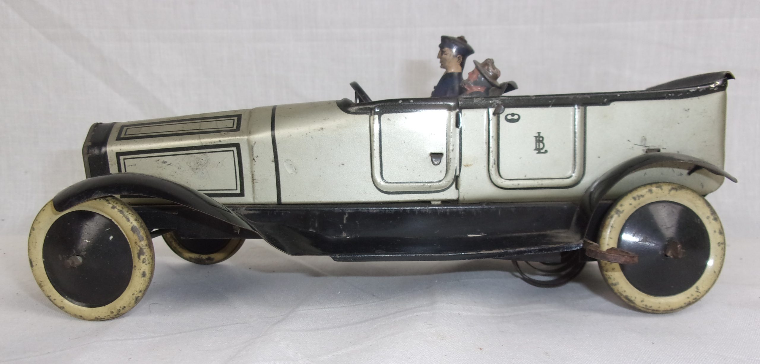 Circa 1915 Burnett Tinplate Toy Touring Car, Chauffeur & Passenger - Image 2