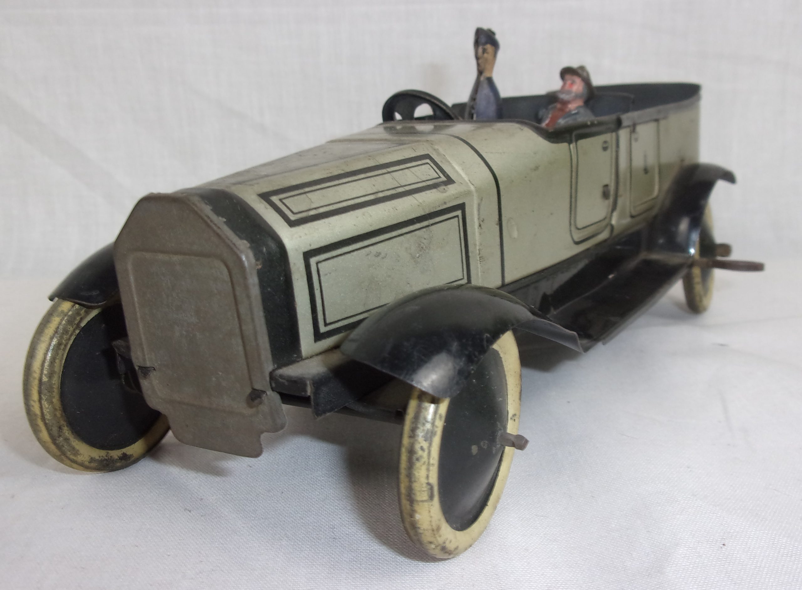 Circa 1915 Burnett Tinplate Toy Touring Car, Chauffeur & Passenger