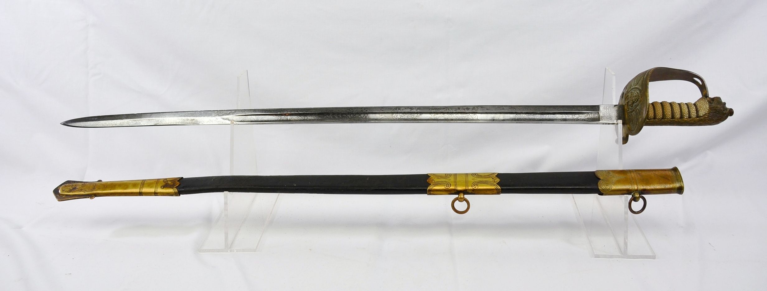 A Post 1902 Royal Naval Officer’s Sword And Scabbard With Serial No