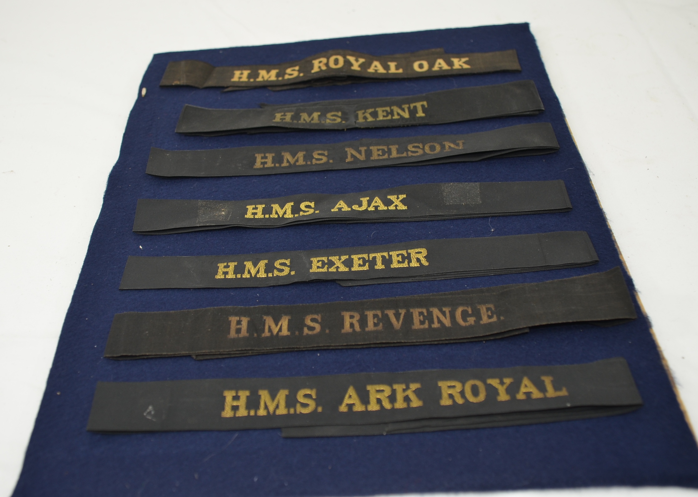 Framed Collection Of Original Navy Cap Tally’s