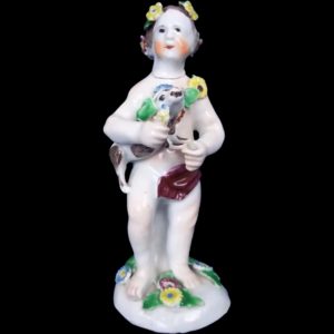 An English Bow Porcelain Figure Of A Putti Holding A Dog, c.1760