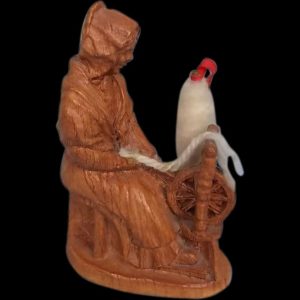 Black Forest Carved Figure Of A Woman Spinning Wool