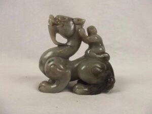 Chinese Qing Dynasty Nephrite Jade Carving Of A Dragon With A Boy On His Back