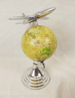 Decorative World Globe Surmounted With A 1960's Chrome Jet Fighter Plane