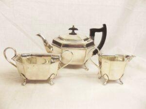 Early Art Deco Three Piece Sheffield Silver Plated Tea Set Of Octagonal Form
