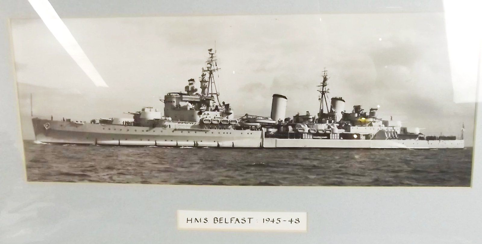 Framed Set of Photographs of Various Royal Navy Ships Including HMS Belfast - Image 2