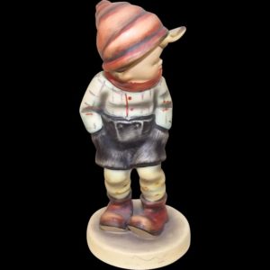 A Goebel Porcelain Figurine Boy - March Winds 43