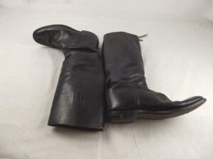 A Pair Of Black Leather Riding Boots