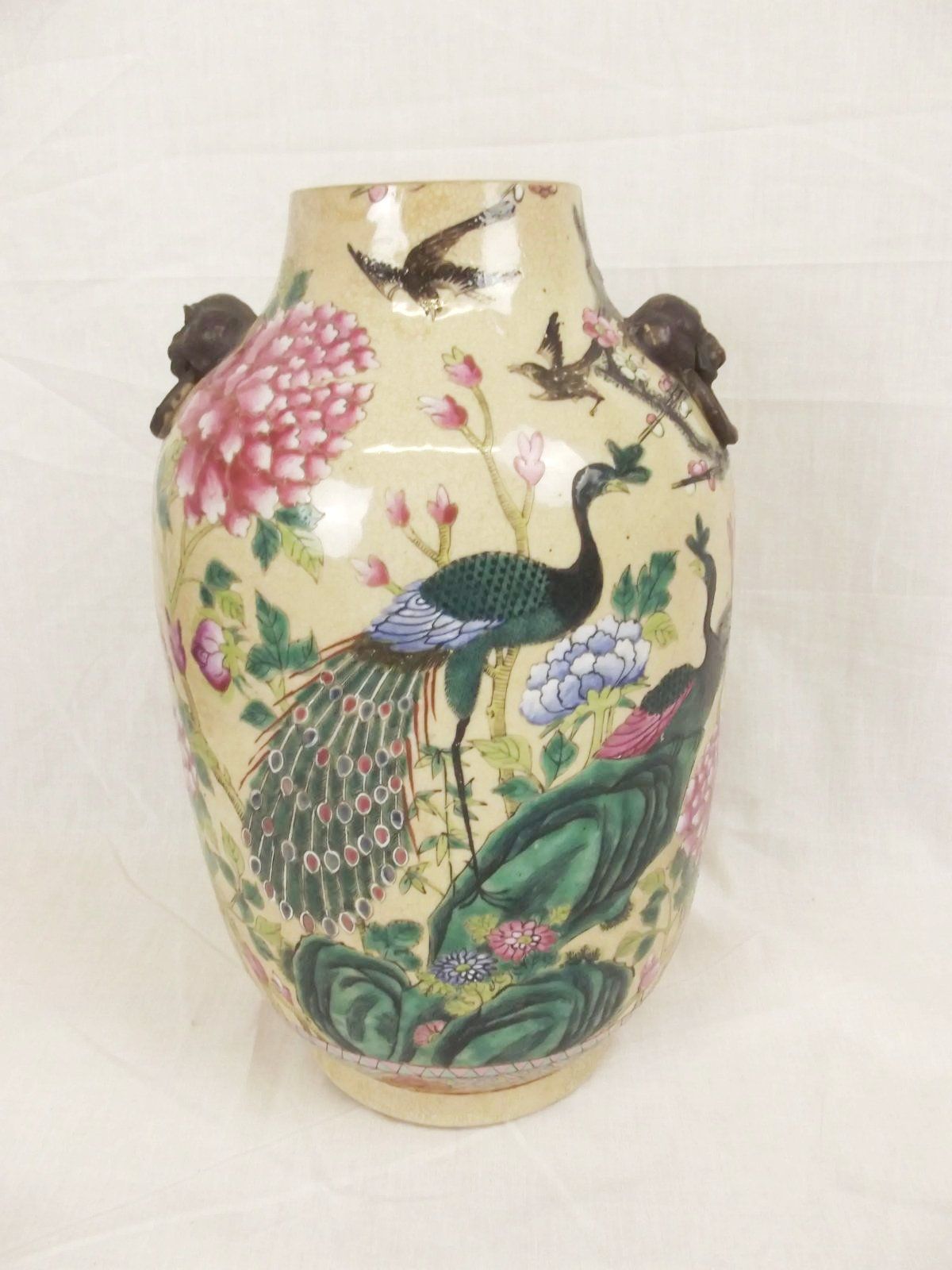 Qing 19th Century Chinese Porcelain Crackle Glaze Vase With Ring Turned Handles In The Famille Rose Palette