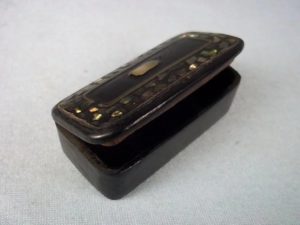 A Victorian Paper Mache And Mother Of Pearl Snuff Box