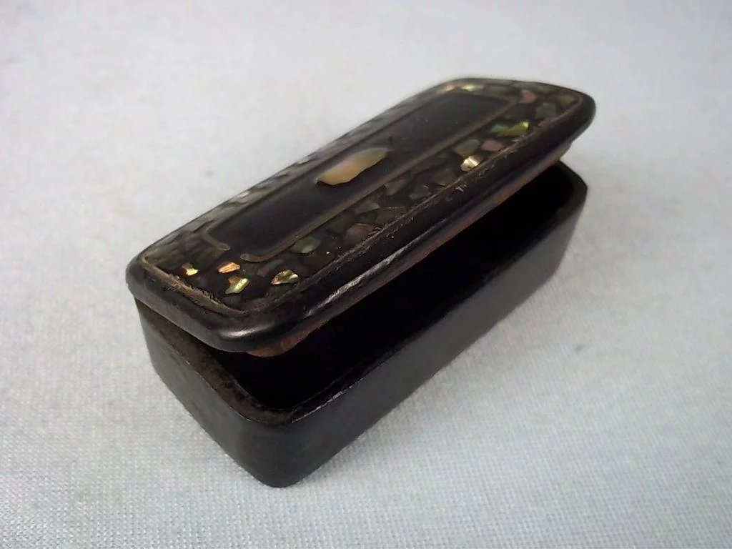A Victorian Paper Mache And Mother Of Pearl Snuff Box