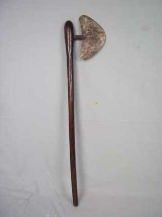 A 19th Century African Tribal Fighting Axe with a Hardwood Shaft