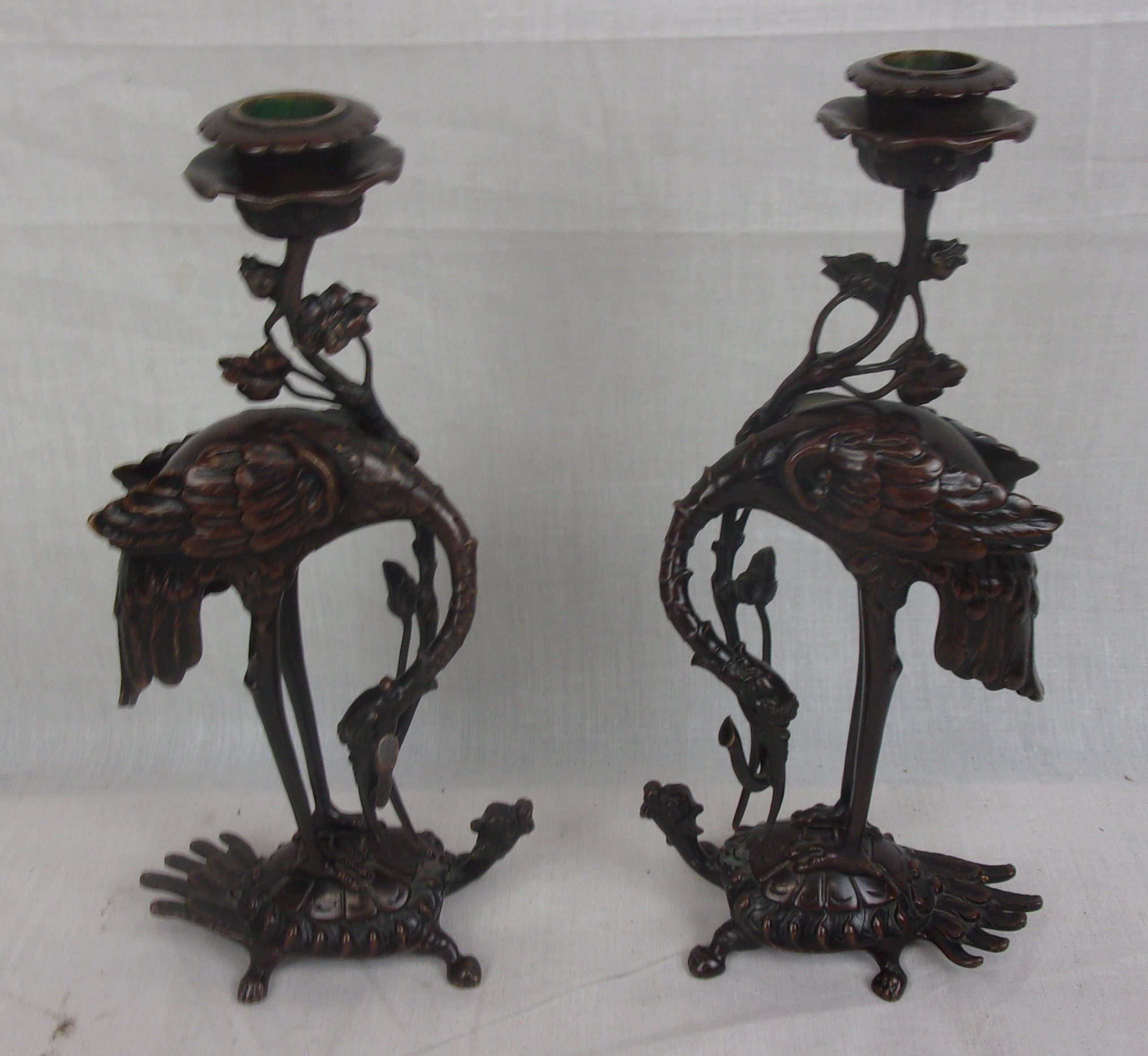 Japanese School (Meiji Period) Pair Of Brown Patinated Bronze Candlesticks Of A Crane And Tortoise