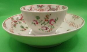 Circa 1800 New Hall Tea Bowl And Saucer With A Ribbons And Floral Pattern