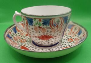 18th Century English Porcelain Teacup And Saucer In Polychrome Enamels With Silvering