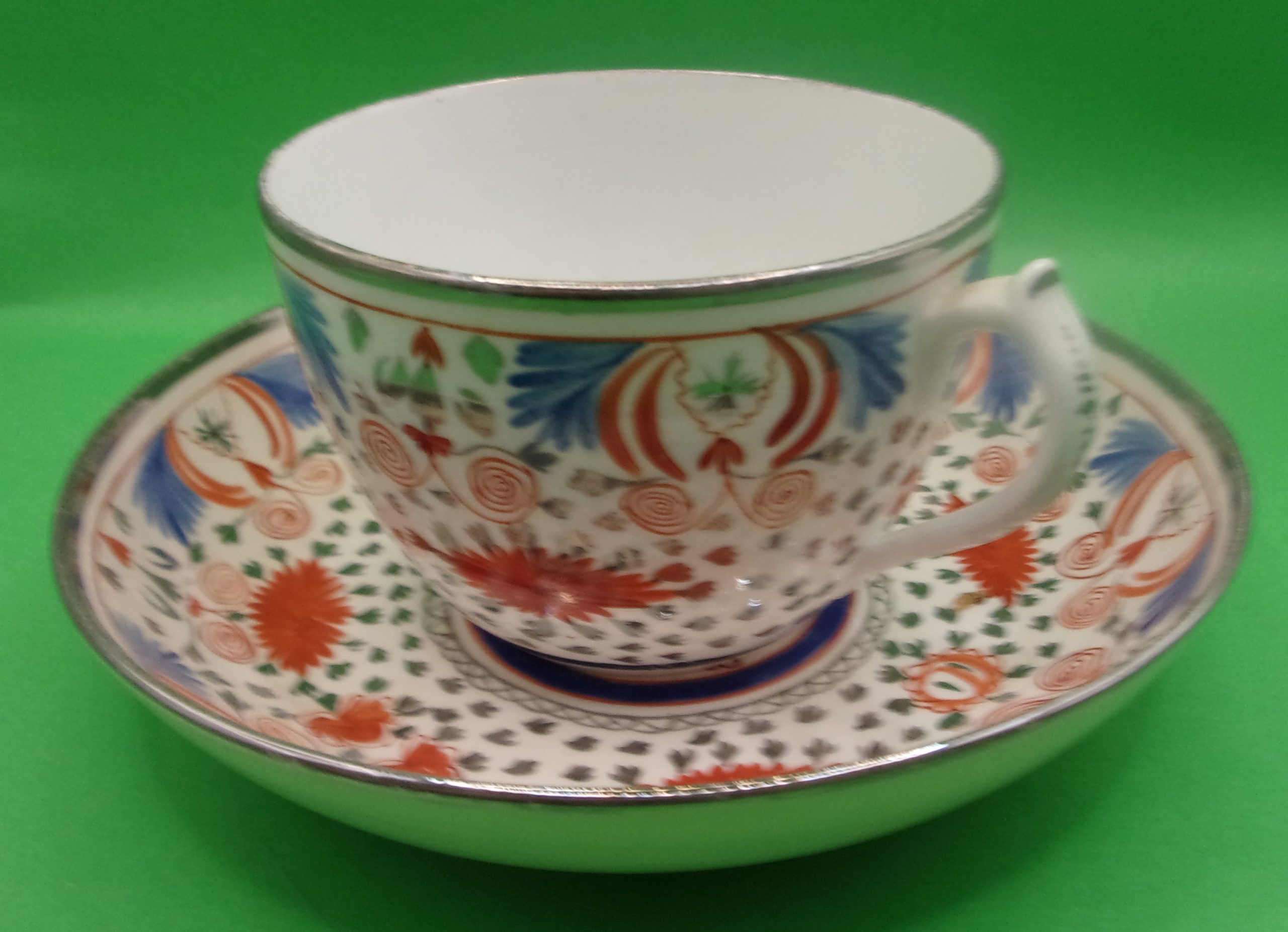 18th Century English Porcelain Teacup And Saucer In Polychrome Enamels With Silvering - Image 11