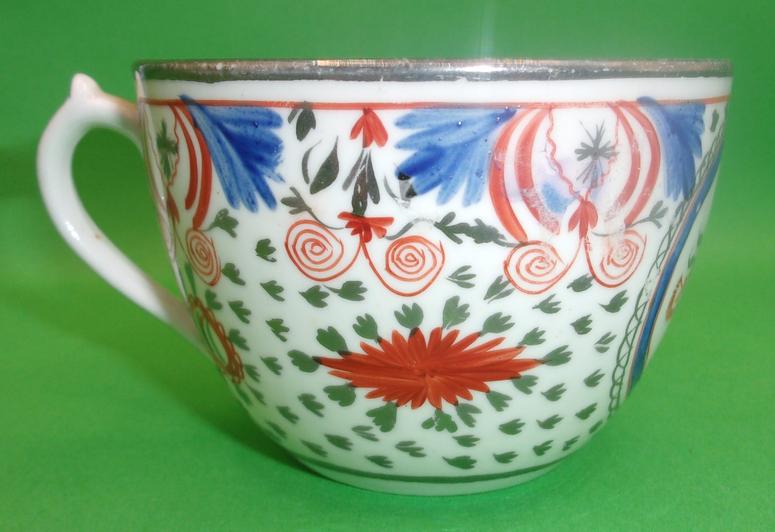 18th Century English Porcelain Teacup And Saucer In Polychrome Enamels With Silvering - Image 6