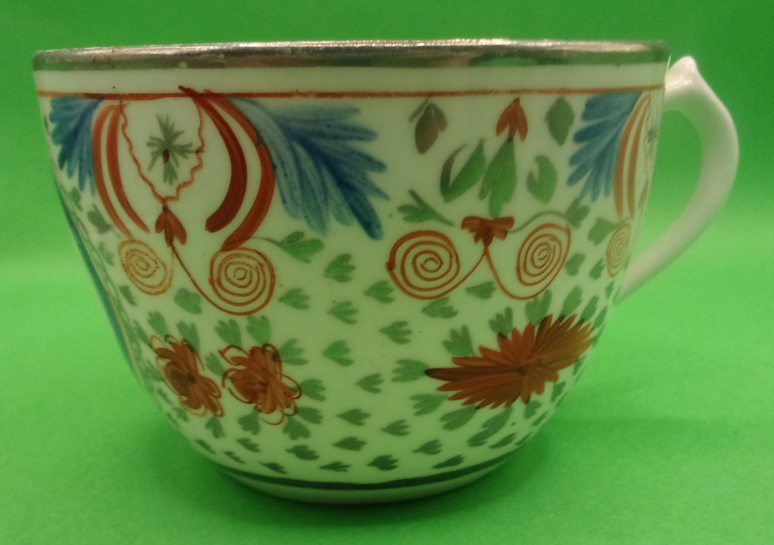 18th Century English Porcelain Teacup And Saucer In Polychrome Enamels With Silvering - Image 4
