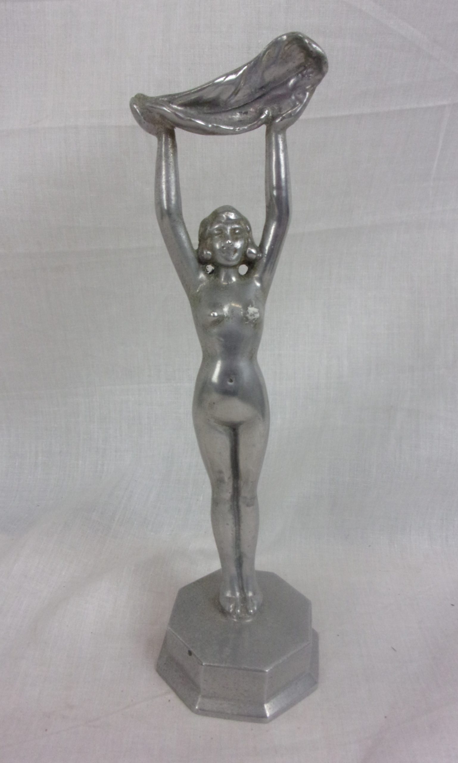 Art Deco Cast Aluminium Figure Of A Nude Lady With A Leaf Held Aloft