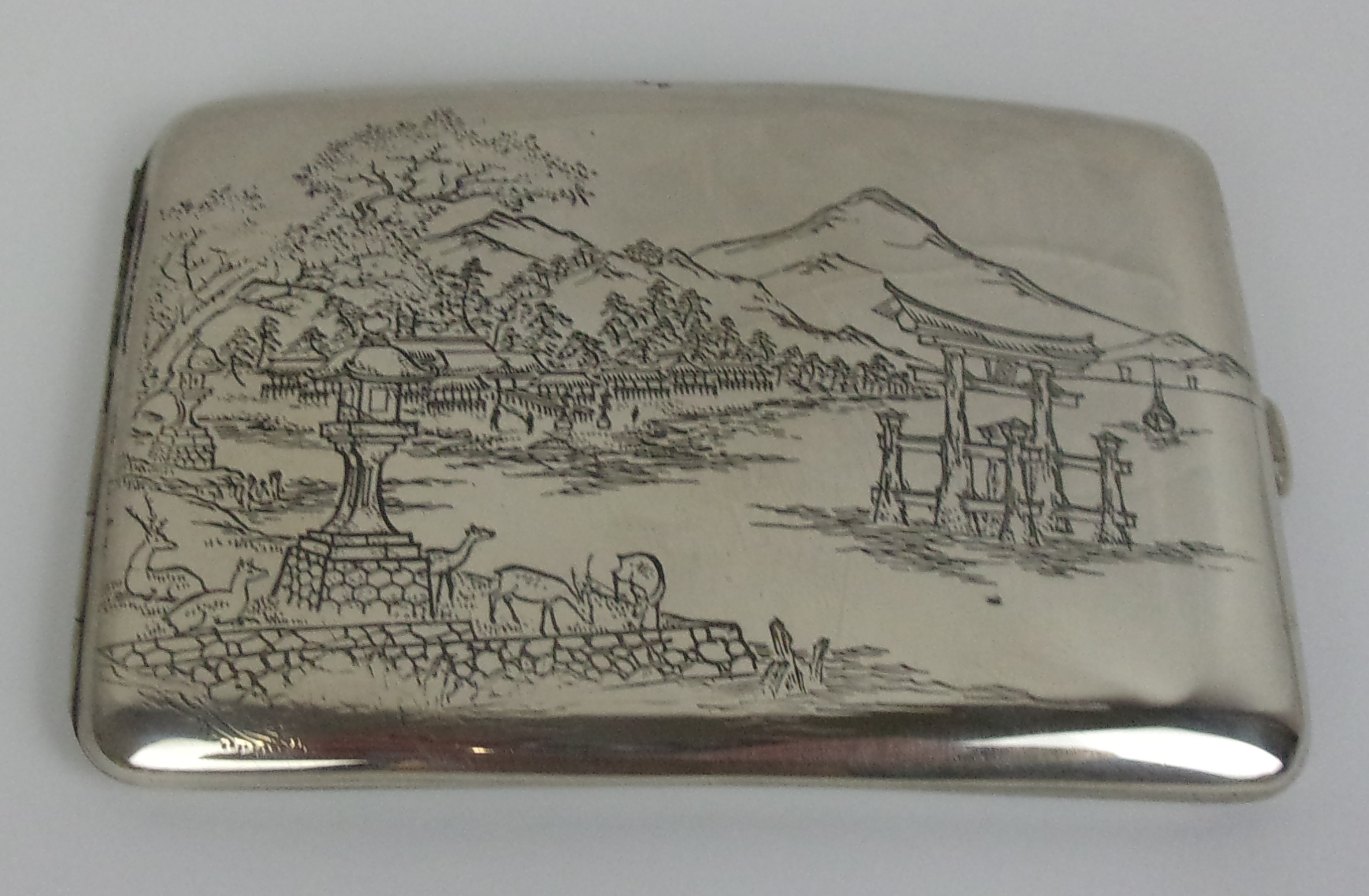 Sterling Silver Cigarette Case With An Etched Japanese Mountain Scene And Gold Inlay To The Interior