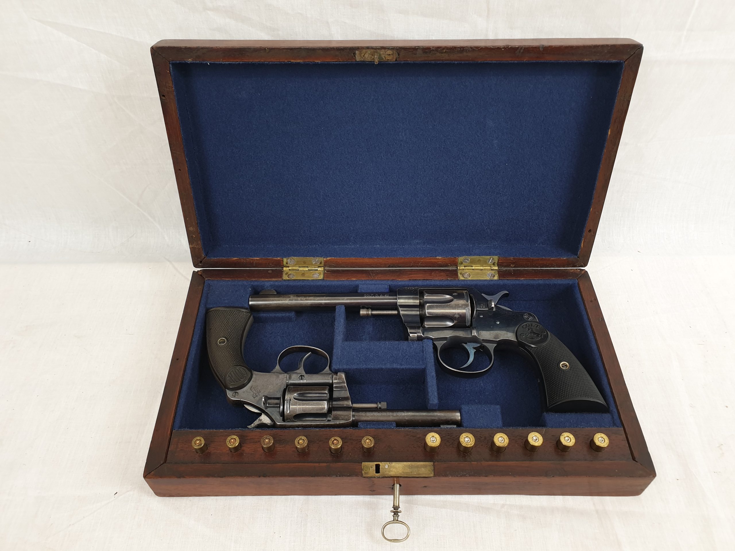 A Pair of 1896 Colt New Police & Colt Model 1892 New Army Revolvers