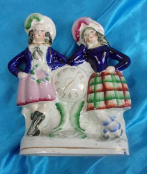 Victorian Staffordshire Scottish Highland Couple With A Mock Clock Dial