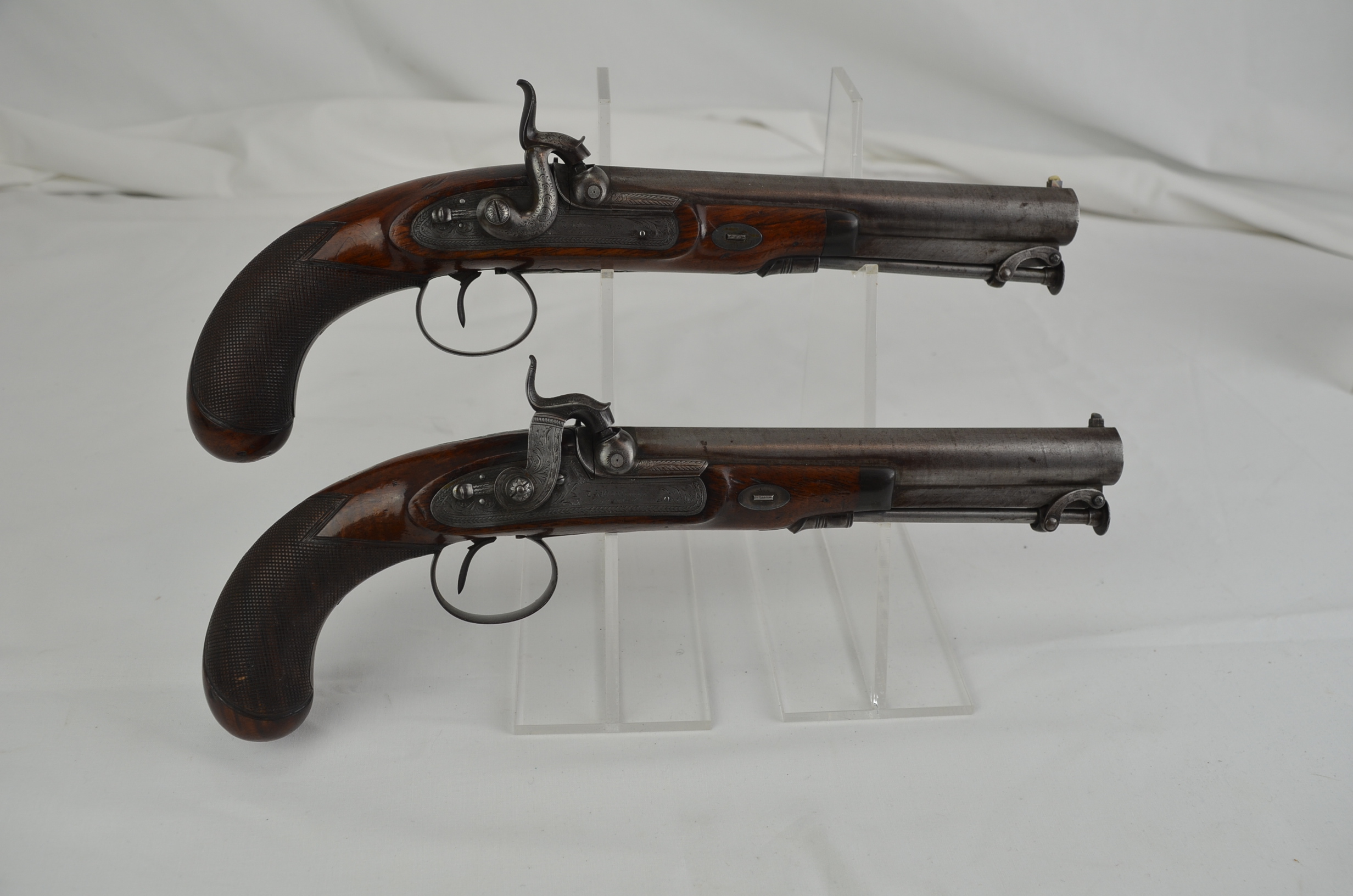 An Early 19th Century Pair of Early Percussion Duelling Pistols by Mortimer