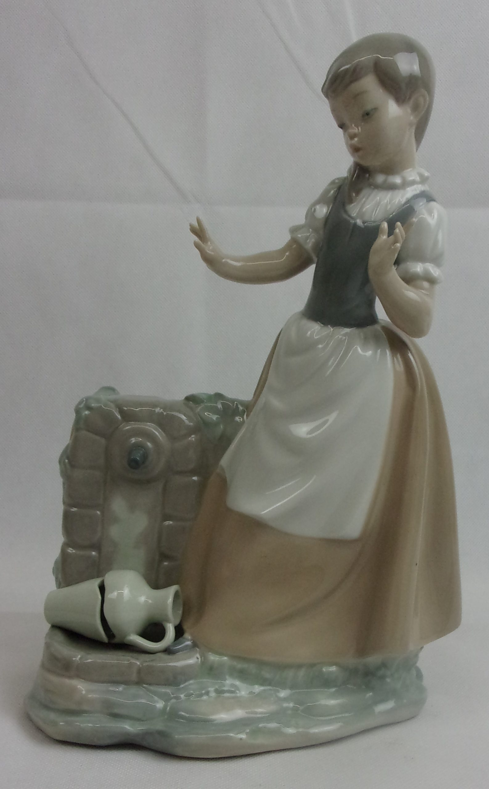 Nao By Lladro Large Hand Painted Porcelain Figure Of A Girl With Broken Jar By Sculptor Vicente Martinez Issued 1992
