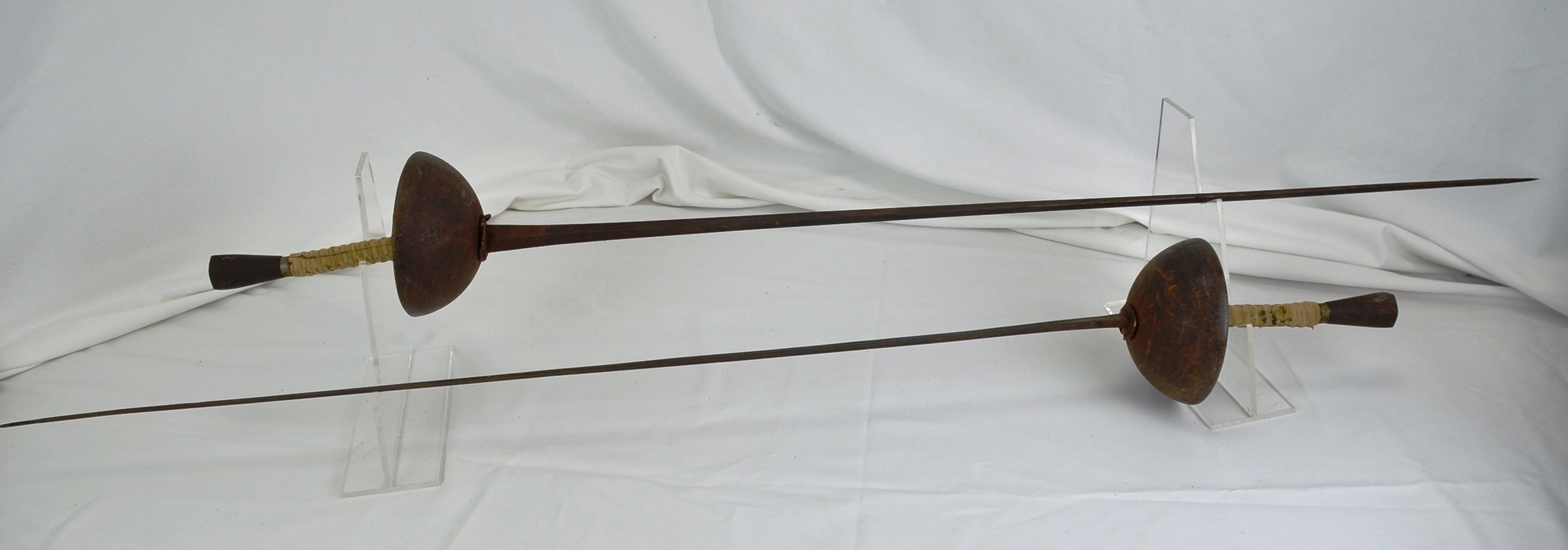 A Pair Of Dualling Eppee's With Triform Blades And Cup Guard