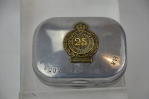 WW1 25th County Of London Cyclists Cap Badge Attached To A WW2 Soap Container
