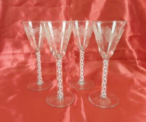 Four 19th Century Drinking Glasses With Acid Etched Grapes And Vines On Opaque Cotton Twist Stems