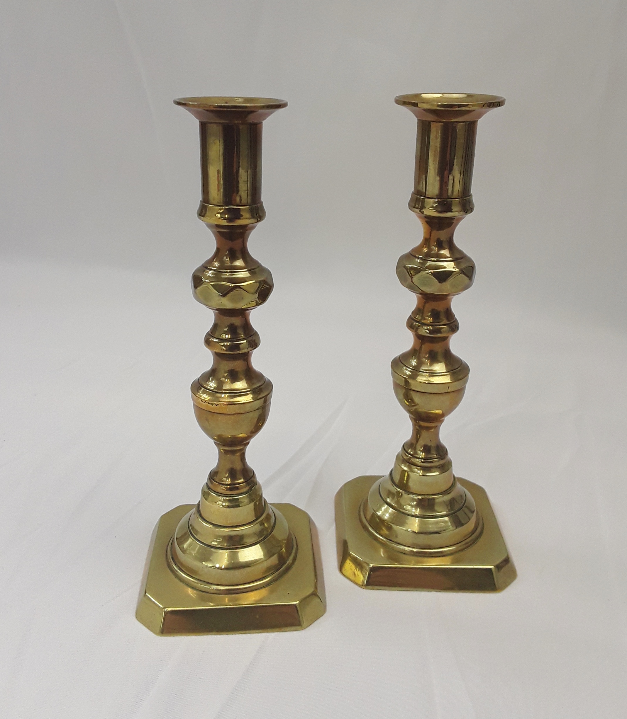 Pair of 19th Century Brass Ejector Candlesticks