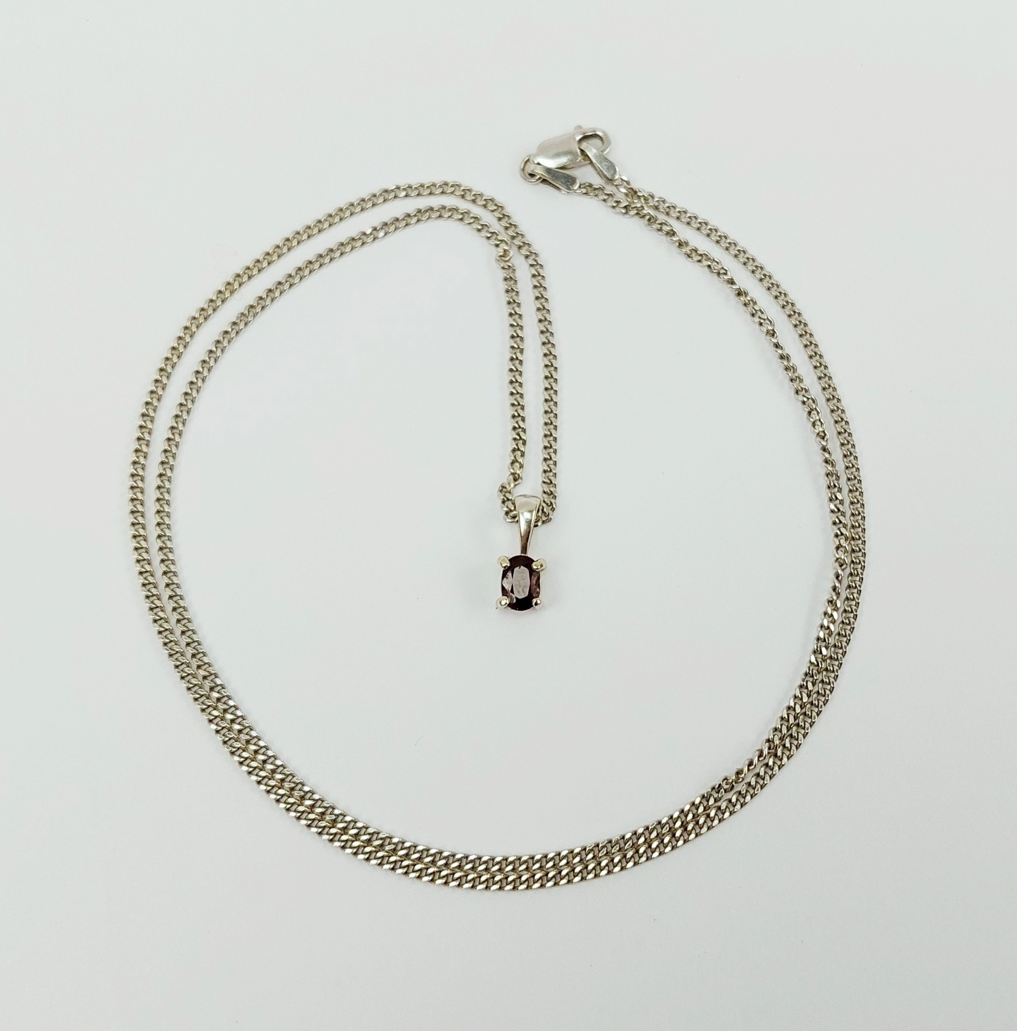 18ct White Gold Ruby Pendant on 9ct White Gold Chain – 19 Inches
