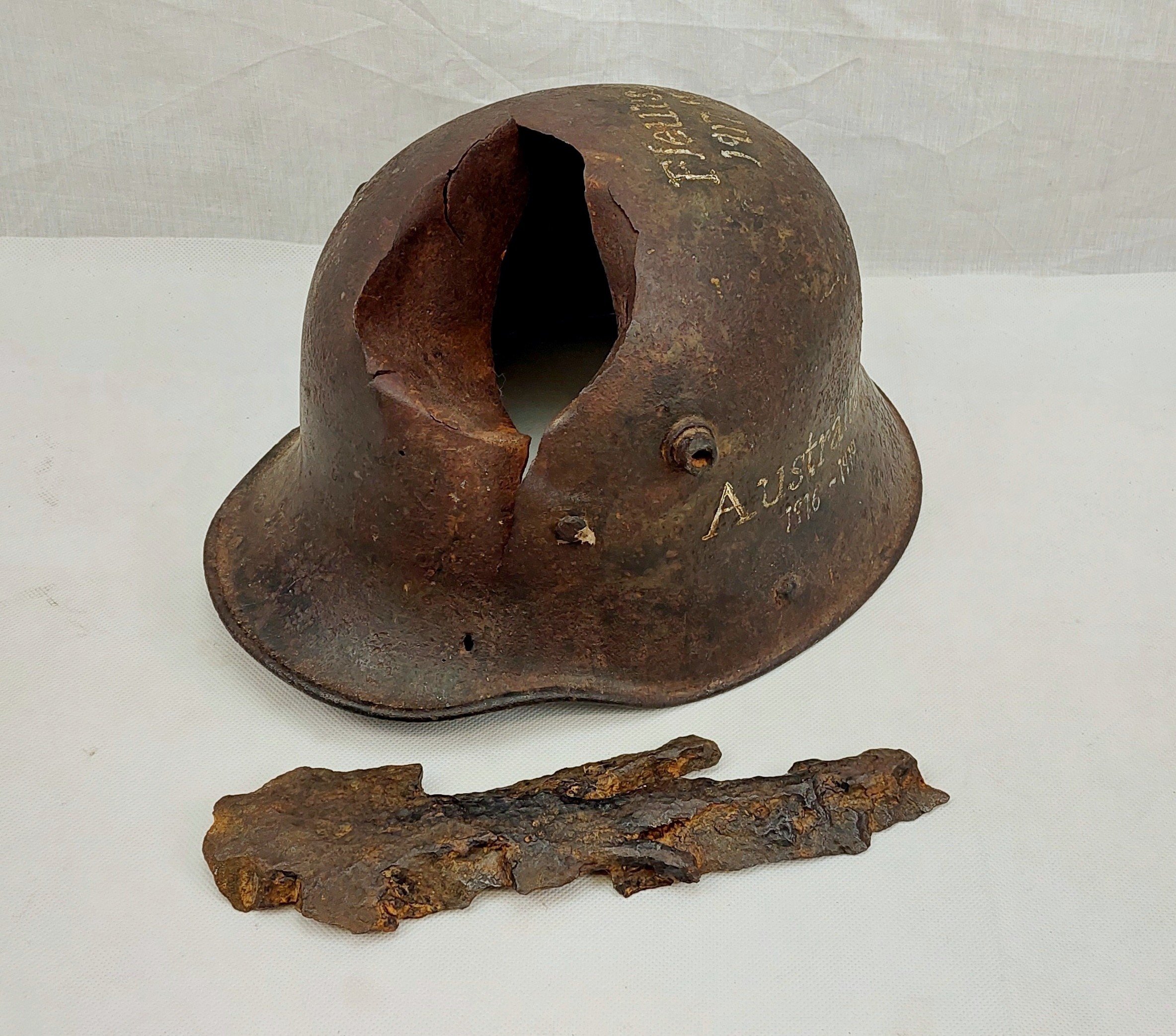 Relic WW1 German M16 Helmet And Shrapnel
