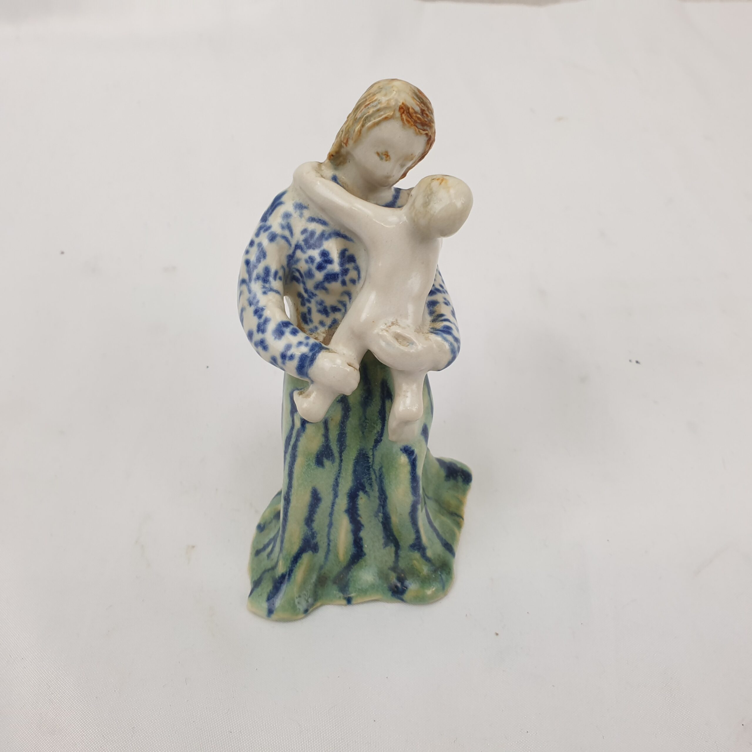 Continental Mid 18th Century Porcelain Figurine Of A Mother And Baby