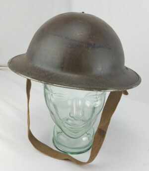 WW2 British Army Brodie MK11 Helmet with Original leather liner by CCL 11 and canvas chin strap. Dated 1943