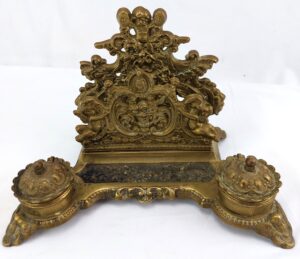 French Baroque, c1900, Repoussé Gilt Brass, Double Ink Well and Letter Holder, decorated with Cherubs