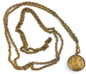 British, WW1, Unique Gentleman's Keepsake Locket and Chain, made from WWI Brass General Service Corps Buttons, embossed with Kings Crown, Royal Coat of Arms, with two original Victorian pictures