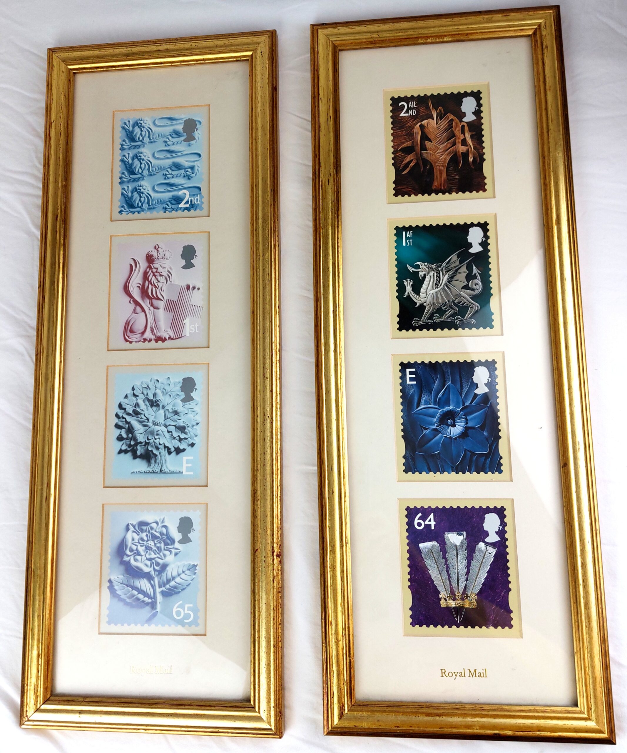 Two Framed Sets of Royal Mail Stamp Designs for England and Wales