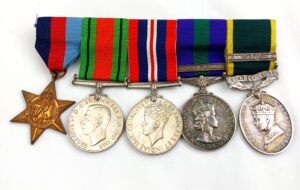 British, WW2, Five Medal Bar for SGT J.J. Barnes Army Catering Corps (ACC), 1939-1945 Star, 1939-1945 Defence Medal, 1939-1945 British War Medal, General Service Medal with Malaya Clasp, Efficiency Medal with Territorial Scroll and QEII Clasp, Mounted for Wearing