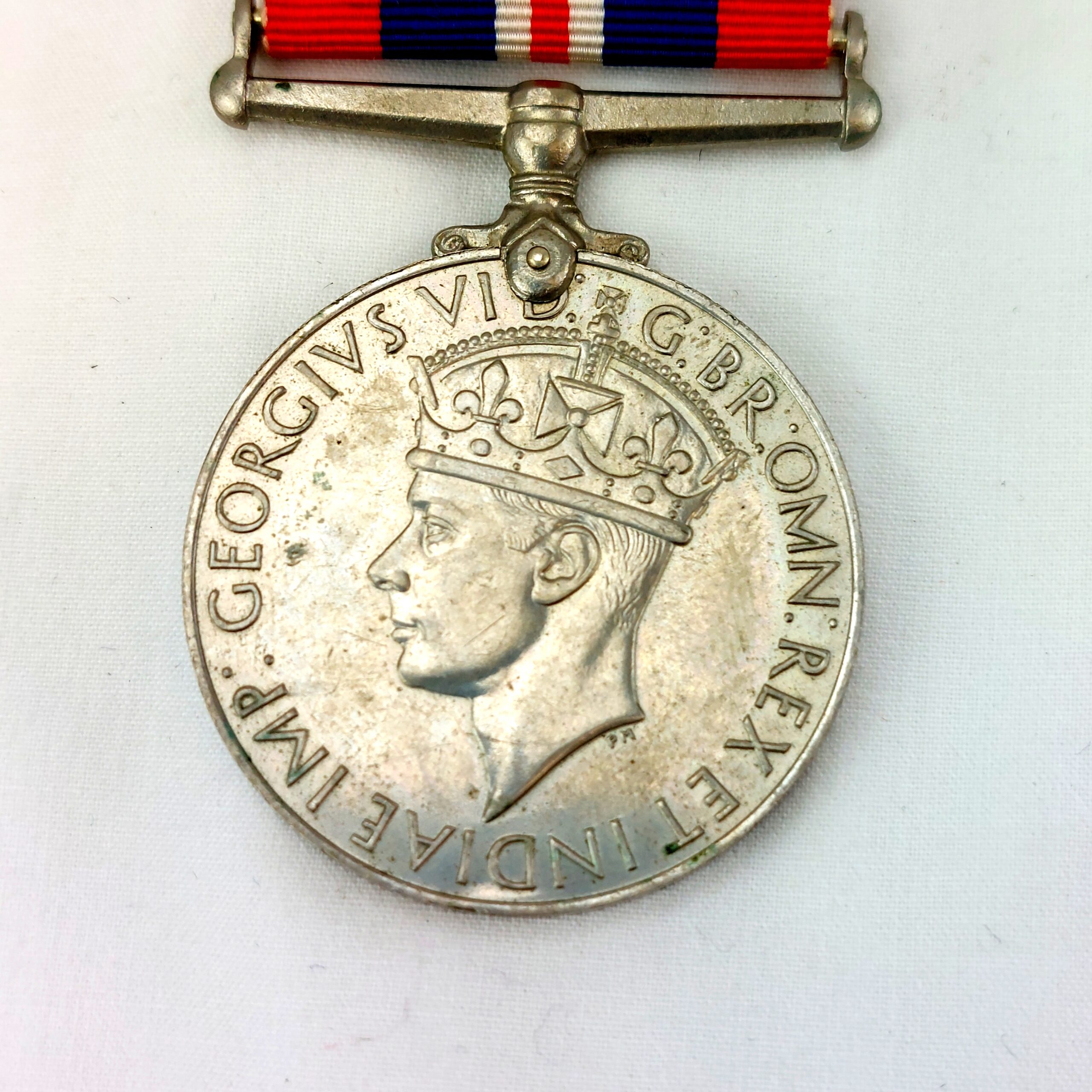British, WW2, Medals and Service records for L.Cpl Leslie H.E. Hough, The France and Germany Star, The 1939-1945 Star, The WW2 War Medal 1939-1945, WW2 Issue letter for medals, Record of Service, The Hampshire Regt (36th & 7th Foot) Regimental History Booklet, Newspaper Clipping of Hampshire Reg't Wounded, EIIR Royal Military Police Blazer Badge, Soldier's Release Book Class A, National Registration Identity Card, Book of 12 B&W Photographs 1940-1944 Oostende - Image 6