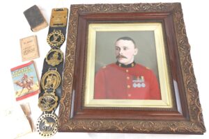 India Mutiny/Anglo-Boer War, Framed Portrait of 3131 E. Lodge Somerset Light Infantry (PA) Infantry Officer, along with Brass Duty Plate and other Brasses, Official Copy Pocket Book of Common Prayer, St Johns Gospel from Miss Perks The Soldiers Home, and Indian /African Stamp Collection