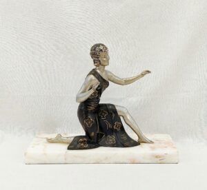 Art Deco Spelter And Marble Figure Of A Flapper Lady