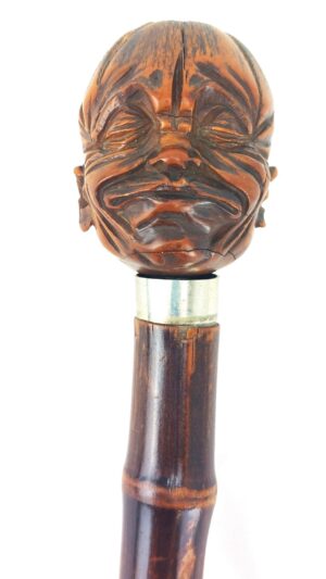 Victorian Walking Stick with Coquilla Nut Head Carved as a Man’s Face, Bamboo Shaft, Metal Collar & Ferrule, L 89cm