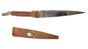 West African Tribal Dagger with Crocodile-Skin Grip and Cowrie-Decorated Sheath