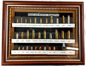 Framed Display of 33 Pistol and Revolver Cartridges, Inert