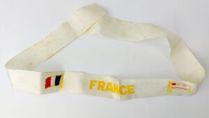 French, Mid-20th Century, SS France French Line Cap Tally (Ruban de Bachi), White Ground with Tricolour and Cie Gle Transatlantique Flag
