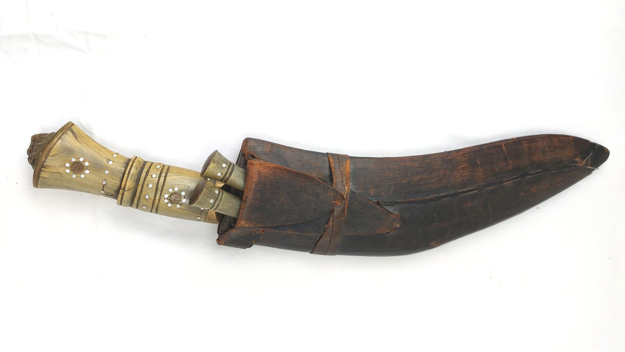 Nepalese, Late Victorian / Early 20th Century Kukri Knife Set, Lion’s Head Pommel, Studded Horn Hilt, with Karda, Chakmak and Leather Covered Scabbard
